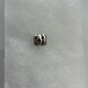 Pandora pumpkin charm with ALE trademark.